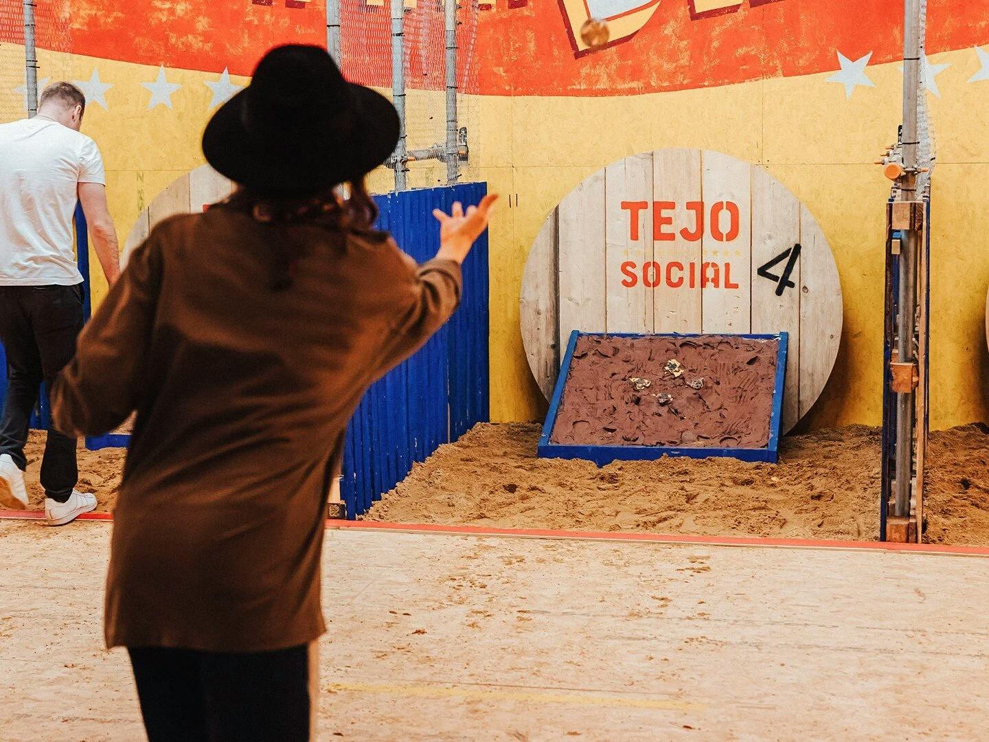 Girl playing Tejo in Medellin
