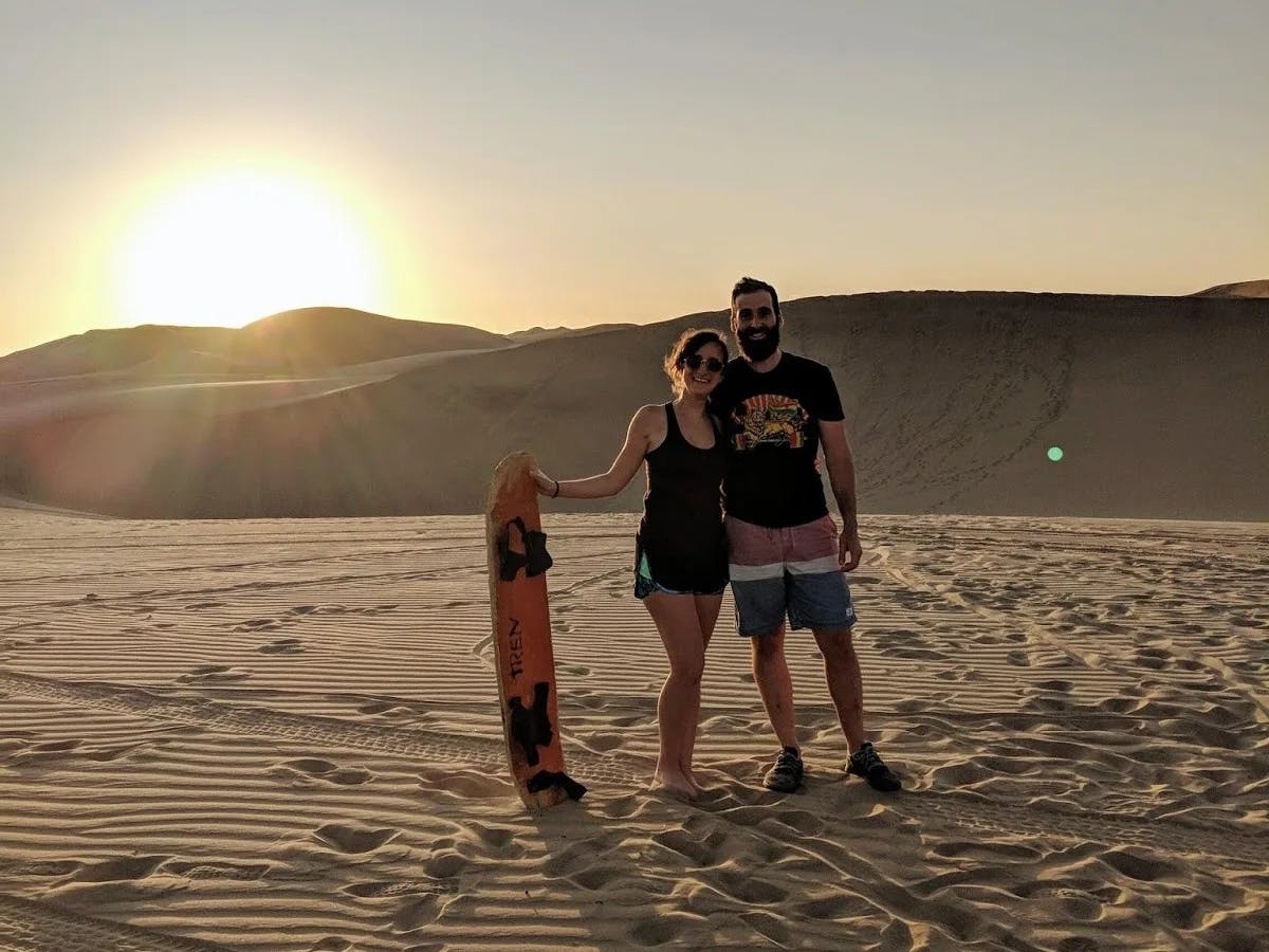My boyfriend Dan and I, sandboarding in Huacachina, Peru with Remote Year.